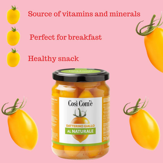 Jar of Così Com’è Datterino Giallo al Naturale (Yellow Datterino Tomatoes in water, 350 g), surrounded by fresh yellow tomatoes on a pink background with text highlighting benefits: source of vitamins and minerals, perfect for breakfast, and a healthy snack.