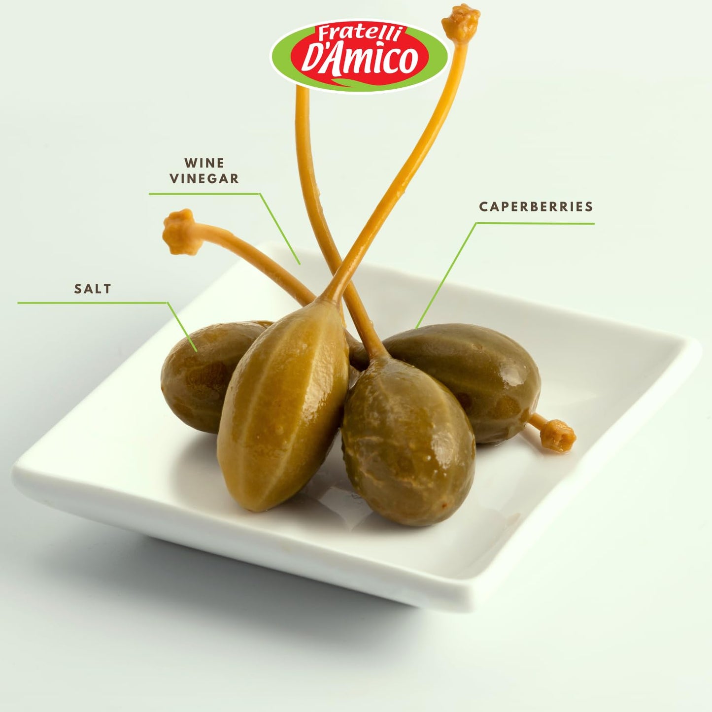 Jar of Fratelli D'Amico caperberries in vinegar, 19 oz (540 g), Italian pickled caperberries with firm texture, tangy flavor, and authentic Mediterranean quality, displayed with some caperberries served in a small dish.
