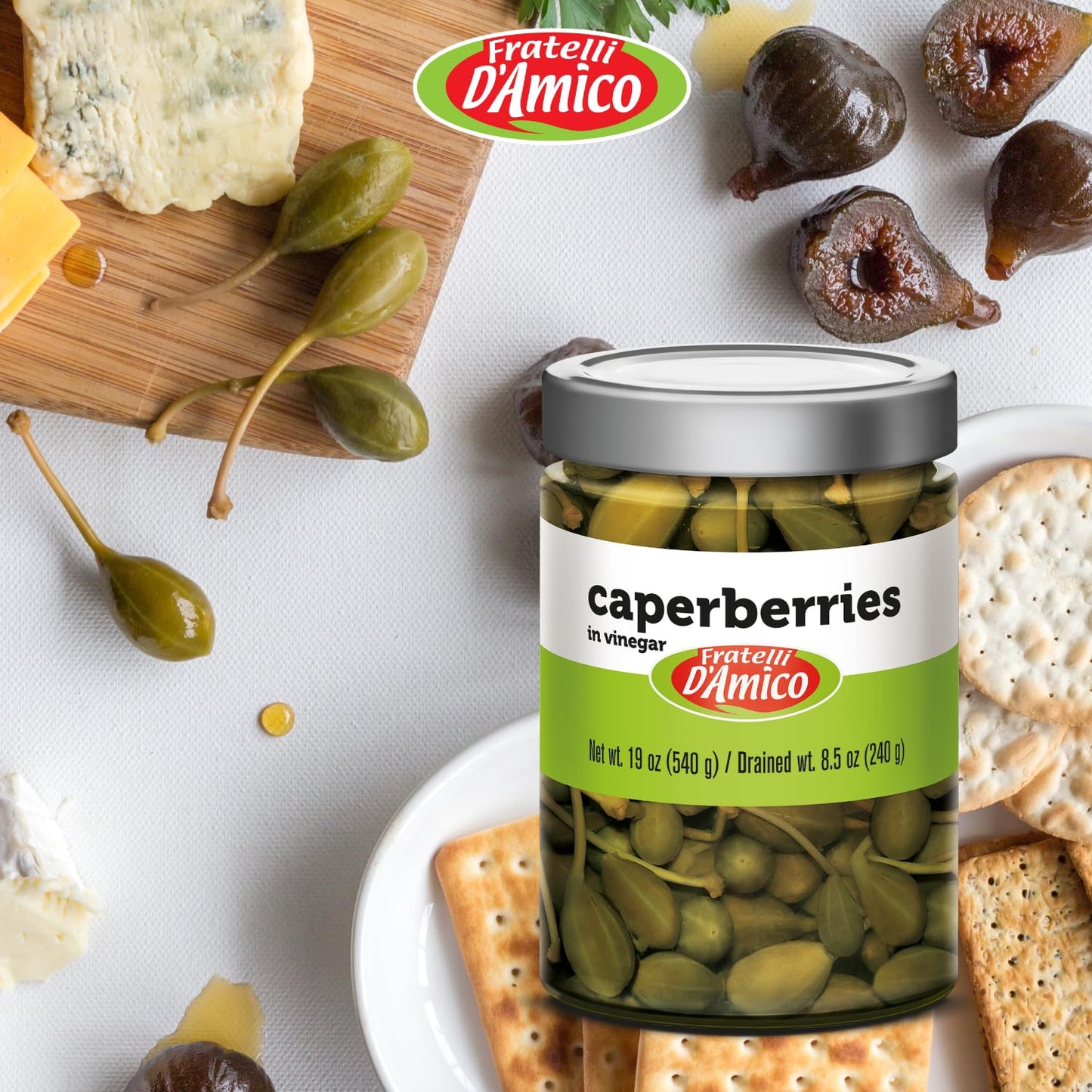 Fratelli D’Amico Caperberries in Vinegar, 19 oz (540 g) glass jar, drained weight 8.5 oz (240 g), displayed with cheese, figs, and crackers for a gourmet appetizer setting.