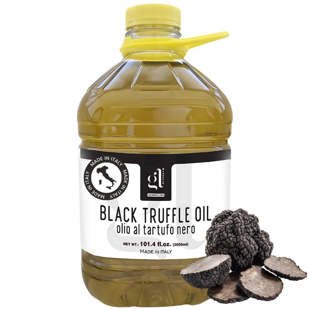 Bottle of black truffle oil with a yellow cap on a white background