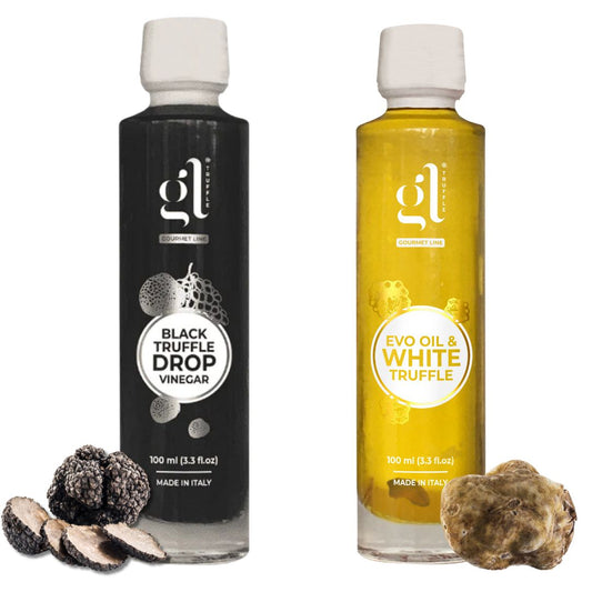 Two bottles of GL Truffle Gourmet Line: Black Truffle Vinegar Drop and Extra Virgin Olive Oil with White Truffle, shown with fresh black and white truffles.