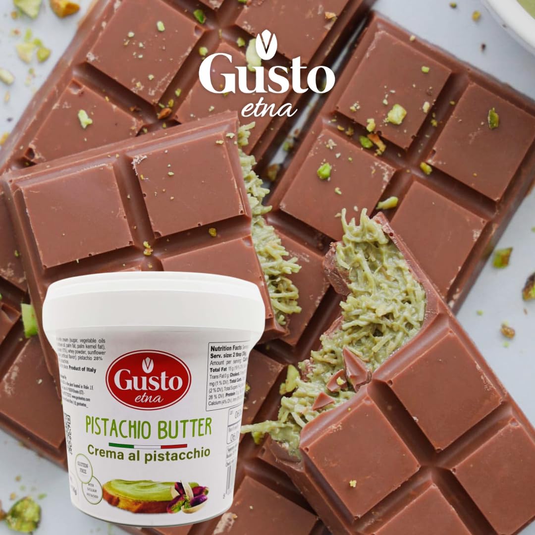 Gusto Etna Pistachio Butter crema al pistacchio jar placed in front of broken dubai chocolate bars filled with pistachio cream and sprinkled pistachio pieces