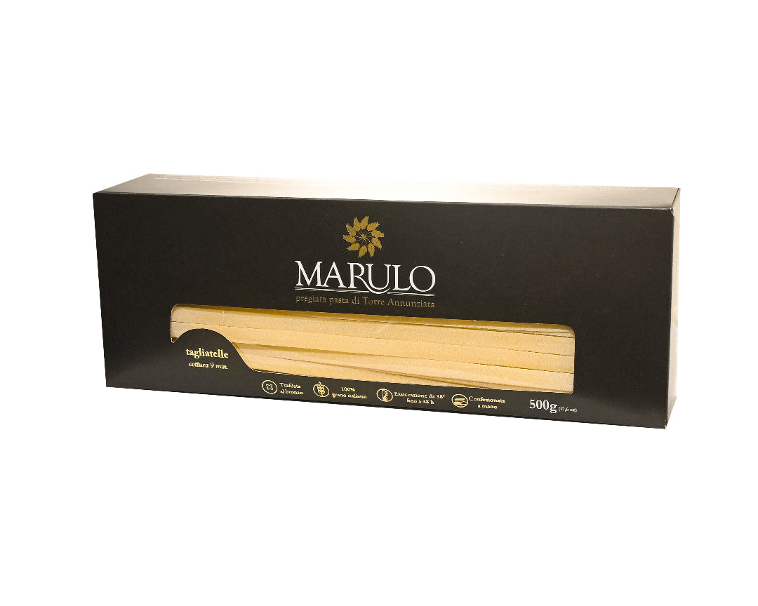 Luxury box of Marulo Tagliatelle artisan pasta, 500g. Authentic Italian pasta from Torre Annunziata, bronze die cut, made with 100% Italian durum wheat semolina and slowly dried up to 48 hours. Traditional gourmet pasta ideal for premium recipes and gifts.