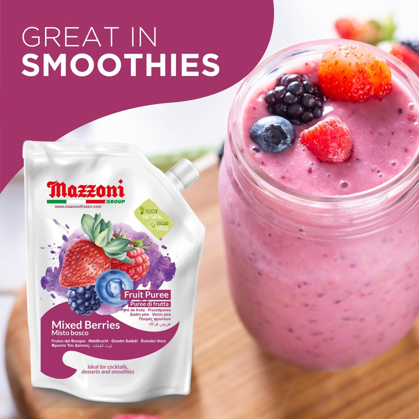 Mazzoni Mixed Berries Fruit Puree packaging with a smoothie in a glass jar topped with berries on a wooden surface.