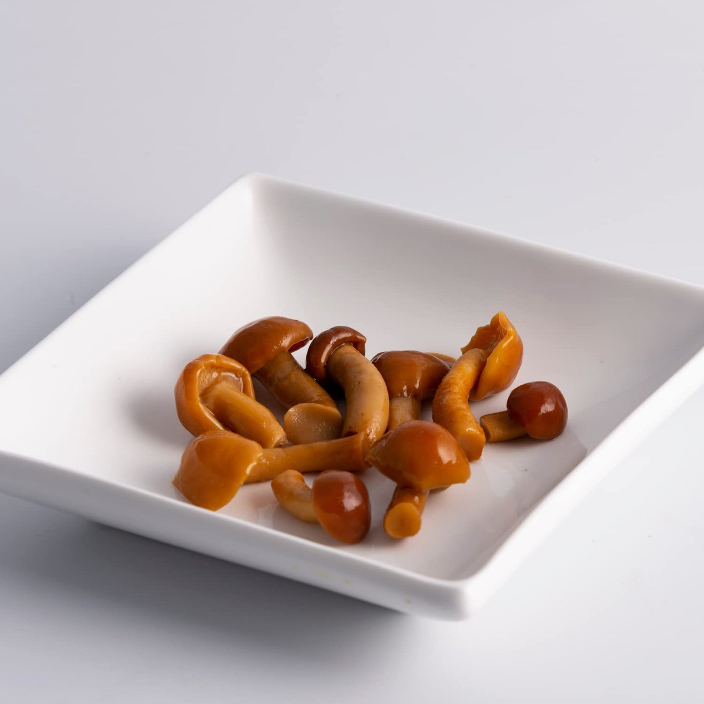 Jar of Fratelli D’Amico nameko mushrooms in brine 470g Italian preserved mushrooms