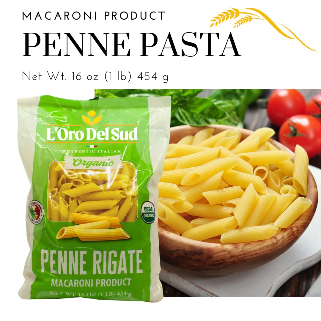 L'Oro Del Sud penne rigate pasta packaging with a bowl of pasta and tomatoes in the background.