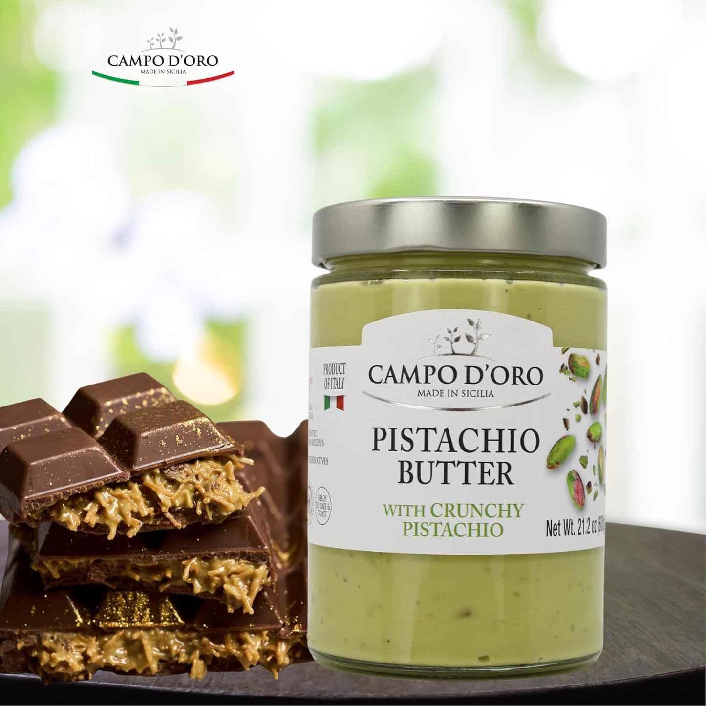 Jar of Campo D’Oro pistachio butter with crunchy pistachio 600g next to gourmet pistachio chocolate bars authentic Italian spread