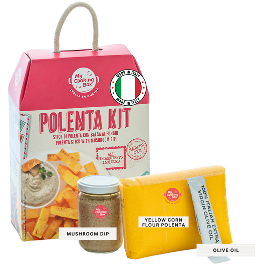 A product image featuring a polenta mix kit which includes a package labeled 'POLENTA KIT', a jar marked 'MUSHROOM DIP', and a bag of 'YELLOW CORN FLOUR'. The items are presented with their labels visible, indicating the ingredients and type of product.
