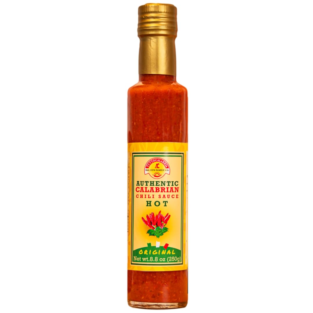 Bottle of Authentic Calabrian chili sauce with a gold cap on a white background