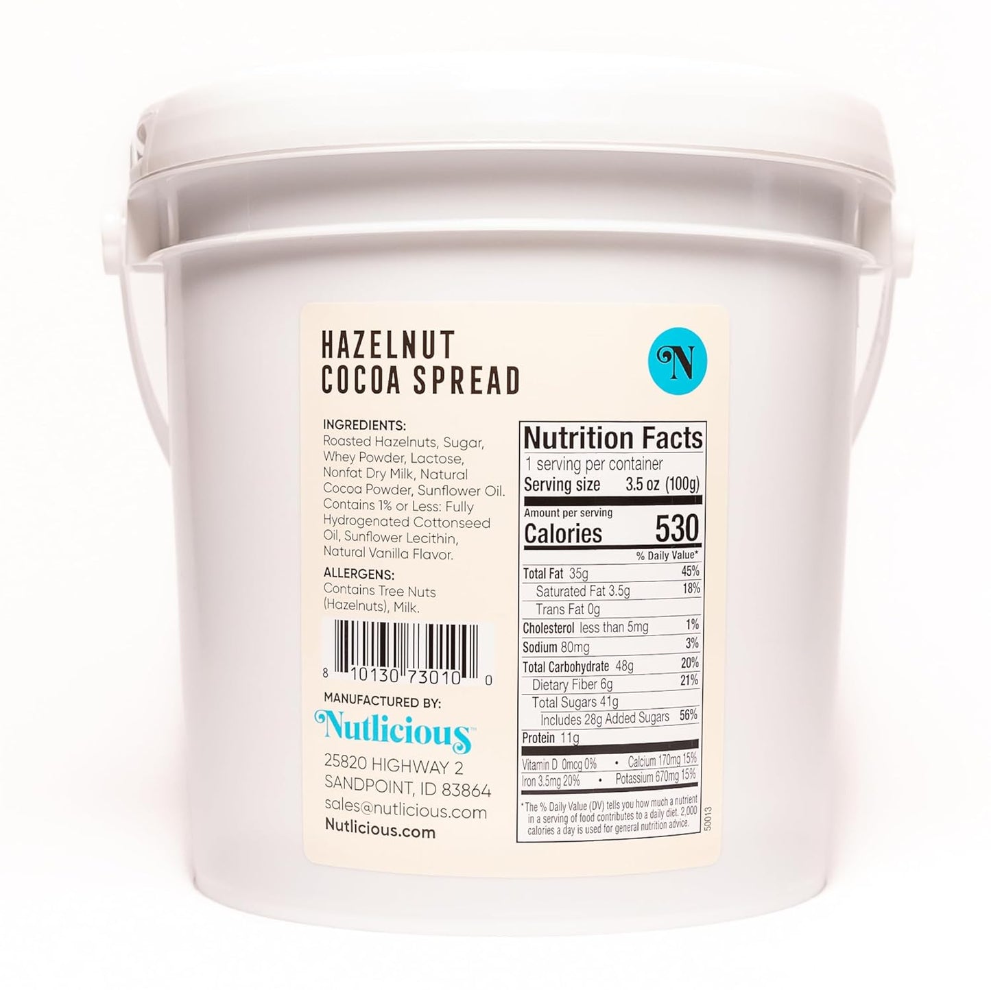 Container of hazelnut cocoa spread with Nutlicious branding and nutrition label.