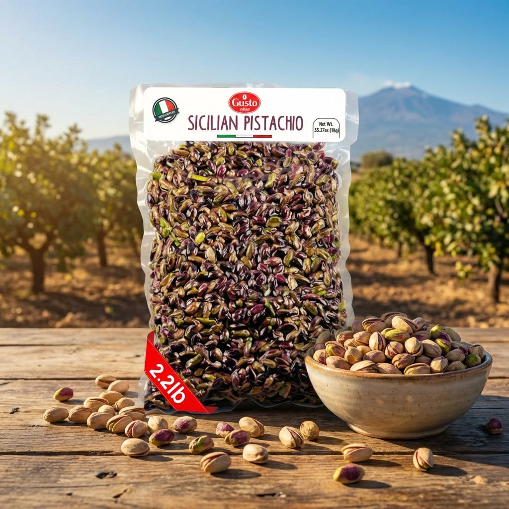 Bag of Sicilian Pistachio with a bowl of pistachios on a wooden table with a scenic background