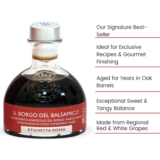Balsamic vinegar bottle with red label on a white background