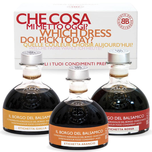 Three bottles of Il Borgo del Balsamico with a promotional banner in the background.