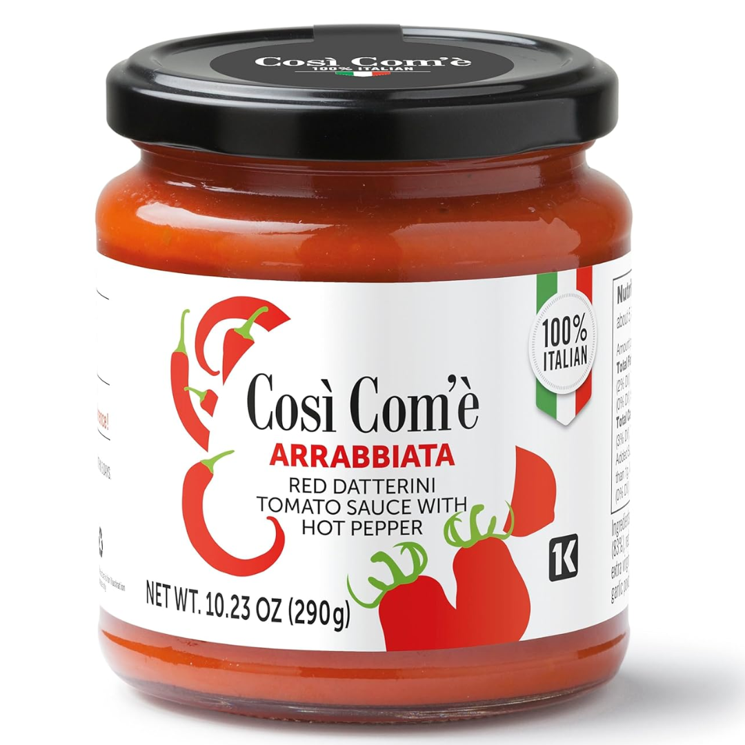 A jar of Cos\u00ì Com'è Arrabiata red datterino tomato sauce with hot pepper. The label shows the brand name, product name, and that it is 100% Italian.