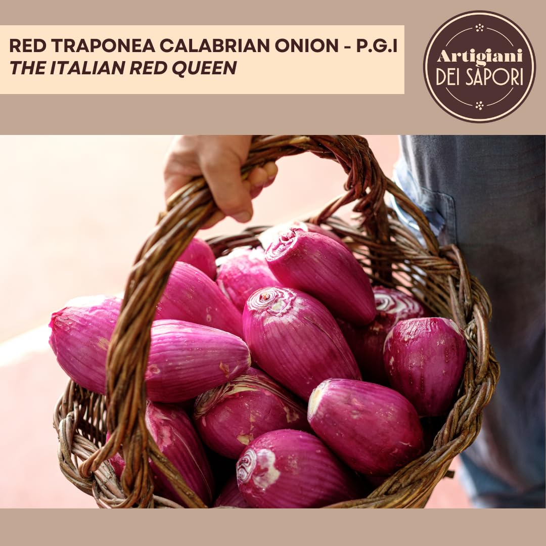 Hand holding a basket filled with fresh Red Tropea Calabrian Onions (P.G.I.), known as the “Italian Red Queen,” showcasing their vibrant purple-red color and elongated shape.