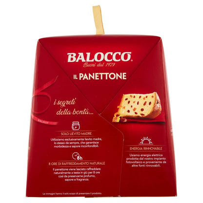 A red Balocco 'Il Panettone' product box with a wooden stick protruding from the top, shown on a plain white background. The packaging features Italian text and a photo of a sliced Christmas pie.