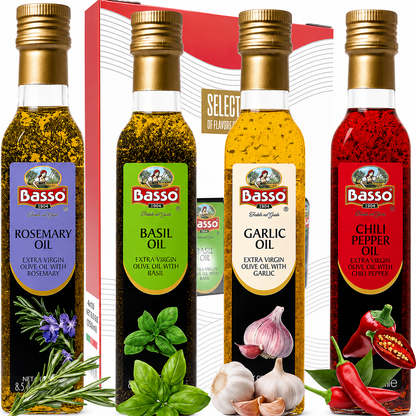 Four bottles of Basso extra virgin olive oil arranged in front of a red-and-white gift box, with ingredient illustrations below: rosemary, basil, garlic, and chili peppers. The bottles have gold caps and colorful labels in purple, green, yellow, and red.