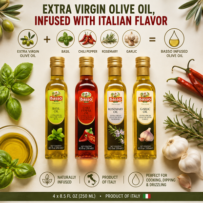 Four Basso-infused olive oil bottles displayed on a styled background with Italian ingredients including basil, garlic, chili peppers, and rosemary. The bottles are labeled Basil, Chili Pepper, Rosemary, and Garlic Oil.