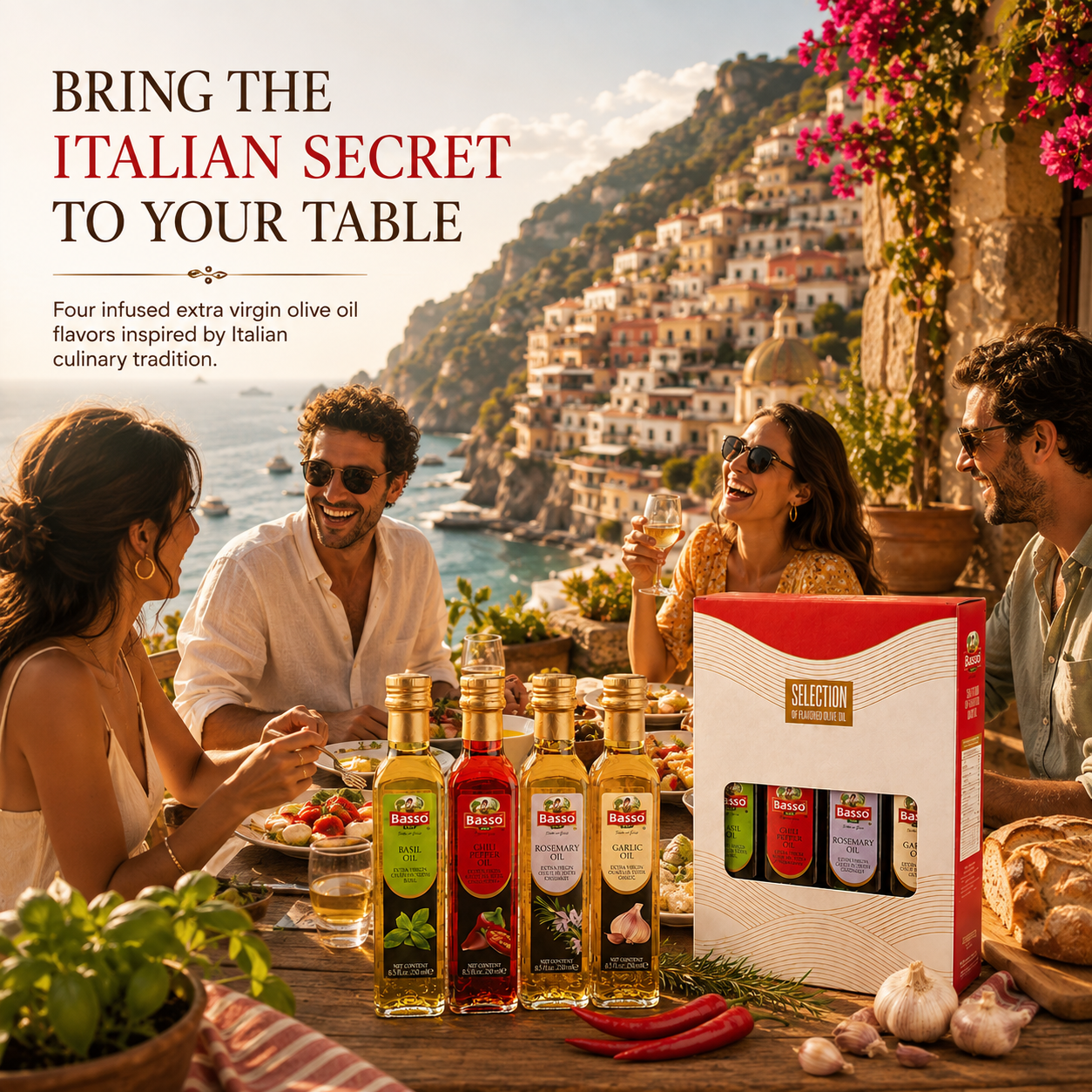 Four bottles of Selection olive oil and a matching gift box displayed on a rustic table in front of a scenic Italian coastal village. Three people are seated at the table, smiling and drinking, with bread, garlic, red chilies, and fresh herbs around them.