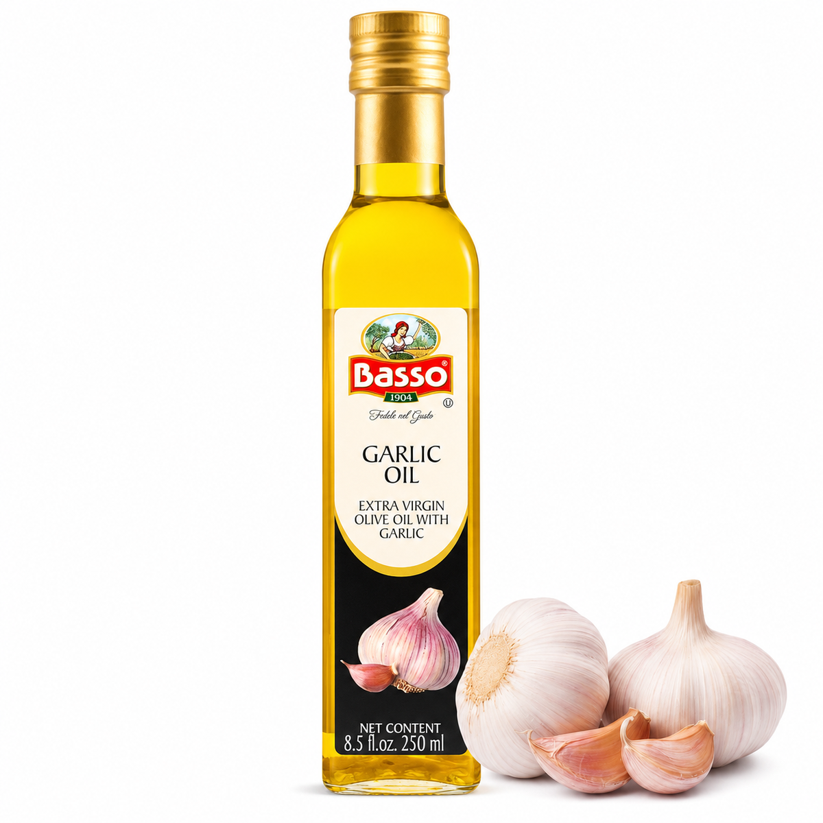 A bottle of Basso Garlic Oil next to three garlic bulbs and garlic cloves on a clean white background.