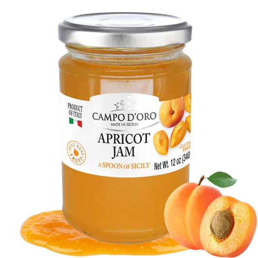 Jar of Campo d'Oro Apricot Jam with apricots on a white background