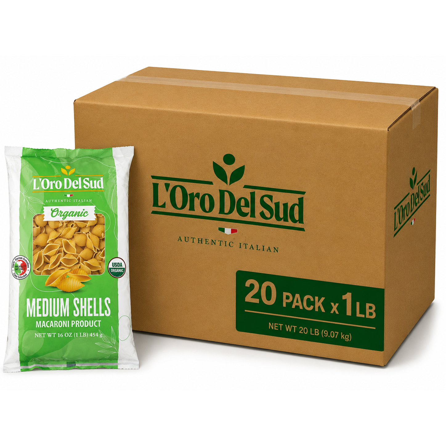 A brown cardboard box of L'Oro Del Sud Organic Medium Shells Macaroni pasta next to a single green and white bag of the pasta on a white background.