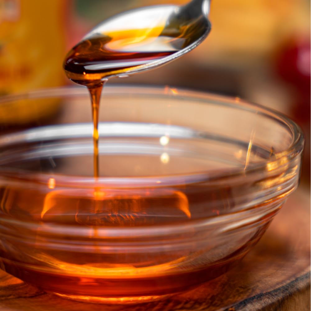 Calabrian chili oil drizzling into a bowl