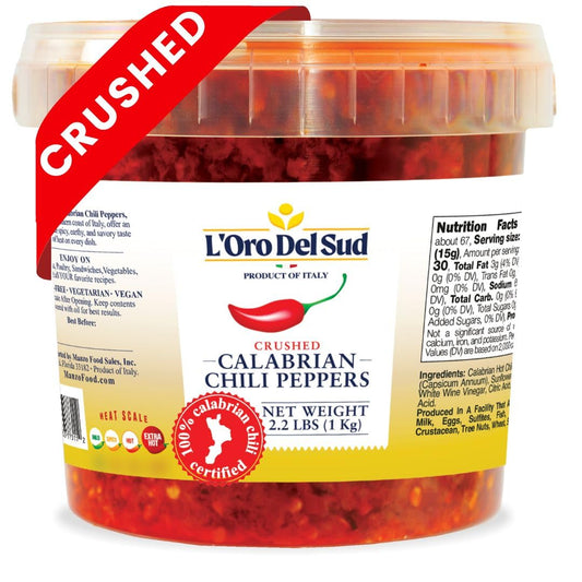 Jar of crushed Calabrian chili peppers with L'Oro Del Sud branding on a white background