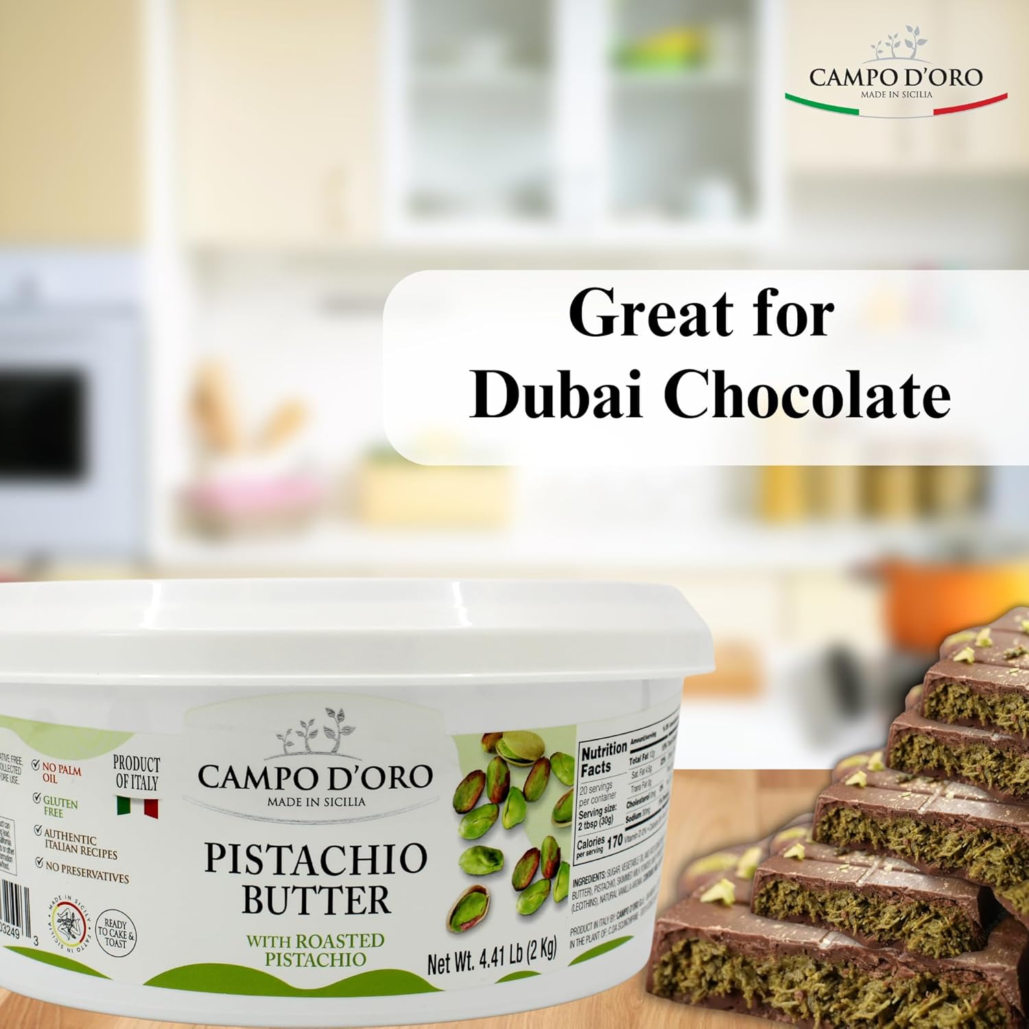 Container of Campo d'Oro Pistachio Butter with a blurred kitchen background