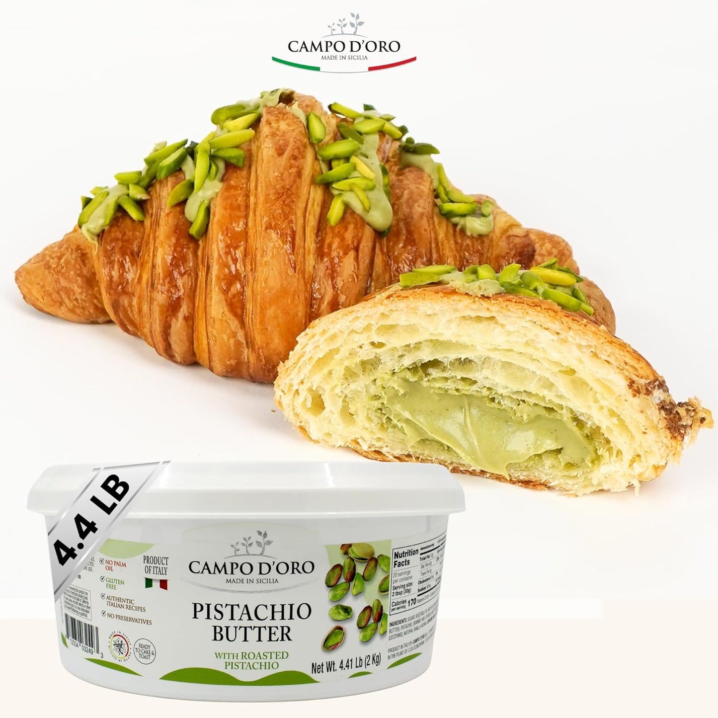 Croissant with pistachio filling and a container of Campo d'Oro pistachio butter on a white background