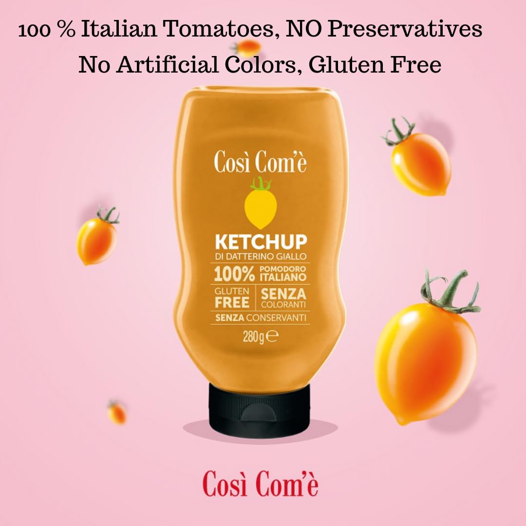Così Com’è Yellow Datterino Tomato Ketchup (280 g) bottle displayed on a pink background with fresh yellow tomatoes around it. Text highlights product benefits: 100% Italian tomatoes, no preservatives, no artificial colors, gluten-free