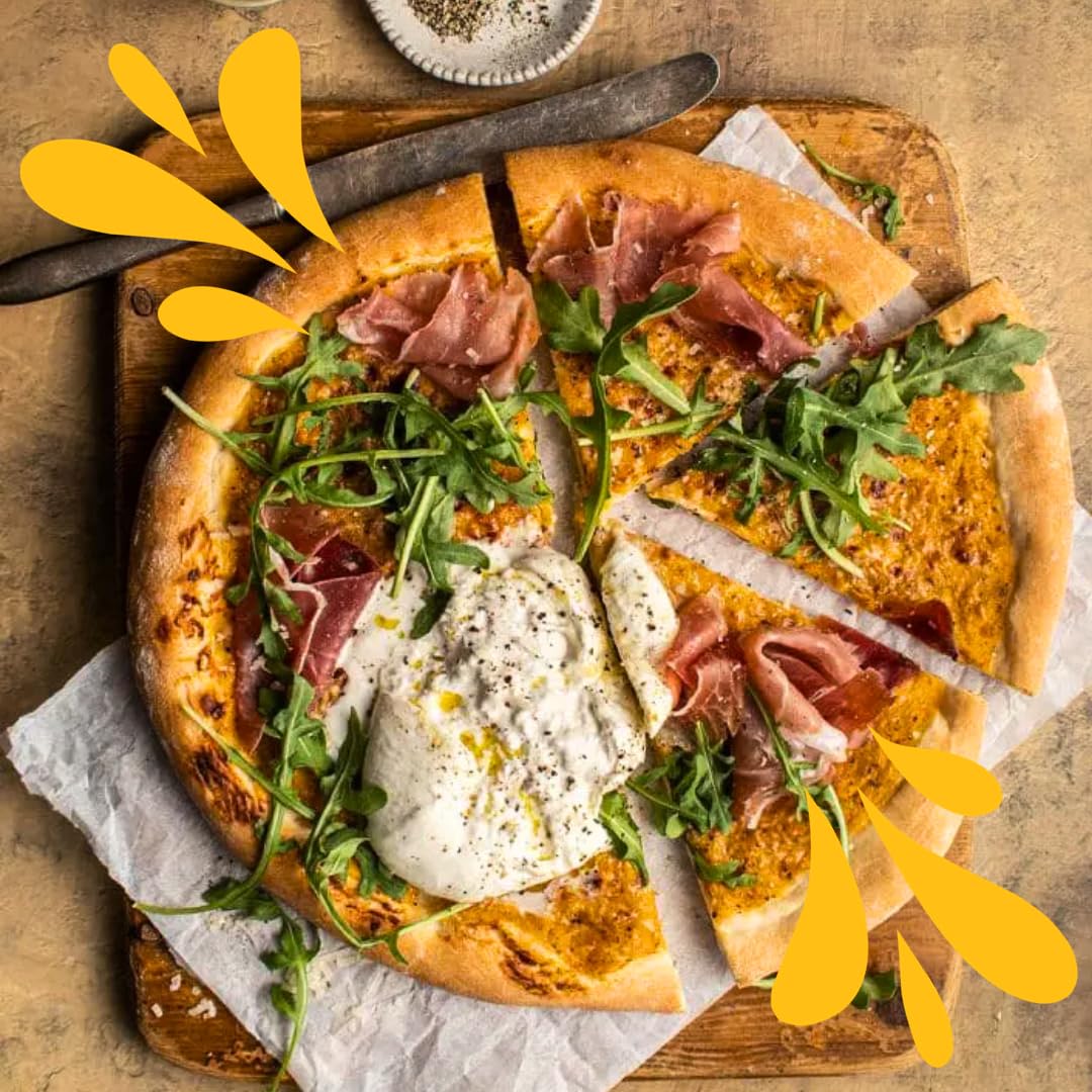 Gourmet pizza topped with arugula, prosciutto, and creamy burrata, served on a rustic wooden board with a golden yellow Datterino tomato sauce base.