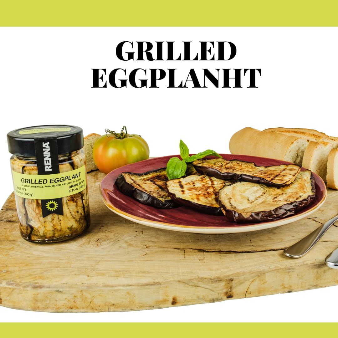 Grilled eggplant on a plate with a jar of Revua Grilled Eggplant and a tomato on a wooden board.