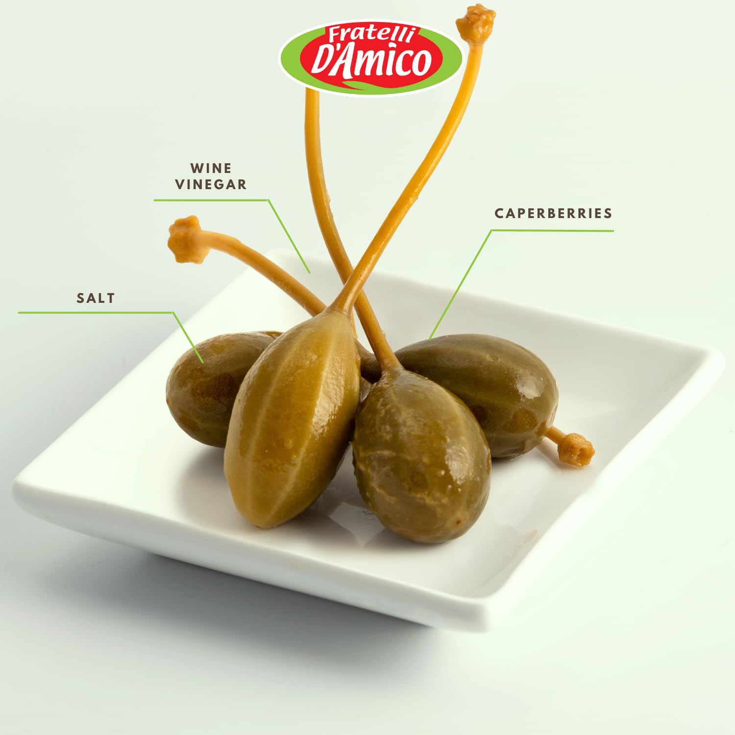 Jar of Fratelli D'Amico caperberries in vinegar, 19 oz (540 g), Italian pickled caperberries with firm texture, tangy flavor, and authentic Mediterranean quality, displayed with some caperberries served in a small dish.