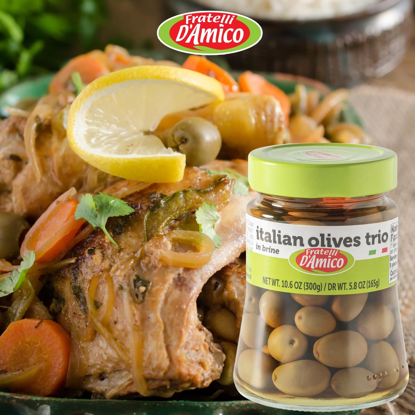 A glass jar of Fratelli D’Amico Italian Olives Trio in brine (10.6 oz / 300g), showcasing a mix of Mediterranean olives packed in Italy. The label highlights "Italian olives trio" with the brand’s green cap and logo. Some whole green olives are placed in front of the jar to display texture and quality.