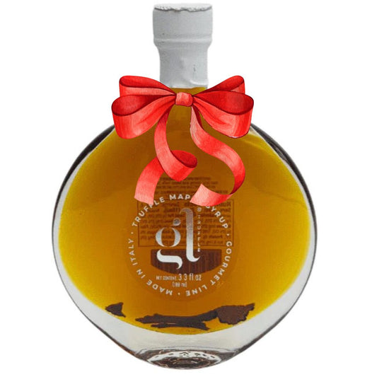 Bottle of truffle maple syrup with a red ribbon on a white background