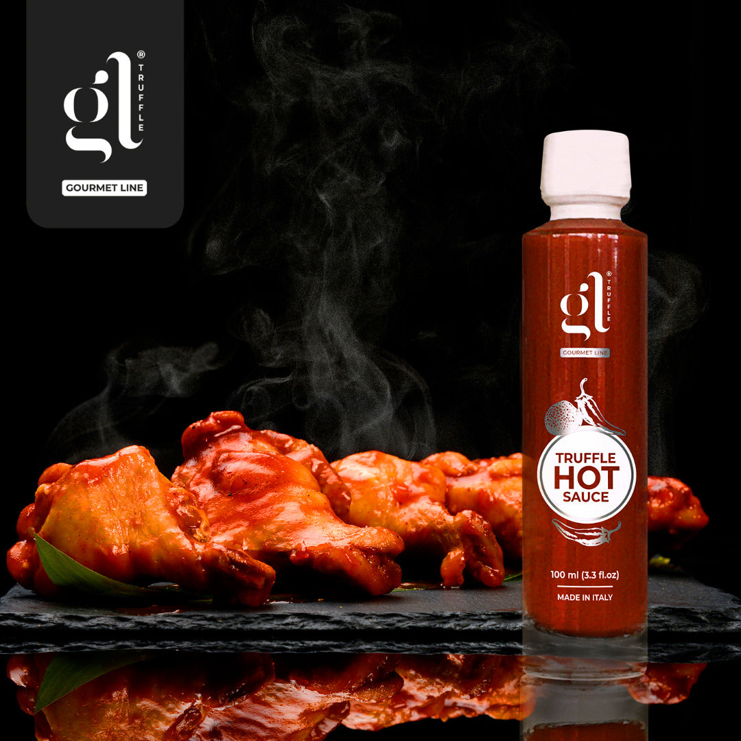 GL Truffle Hot Sauce bottle with spicy chicken wings and steam