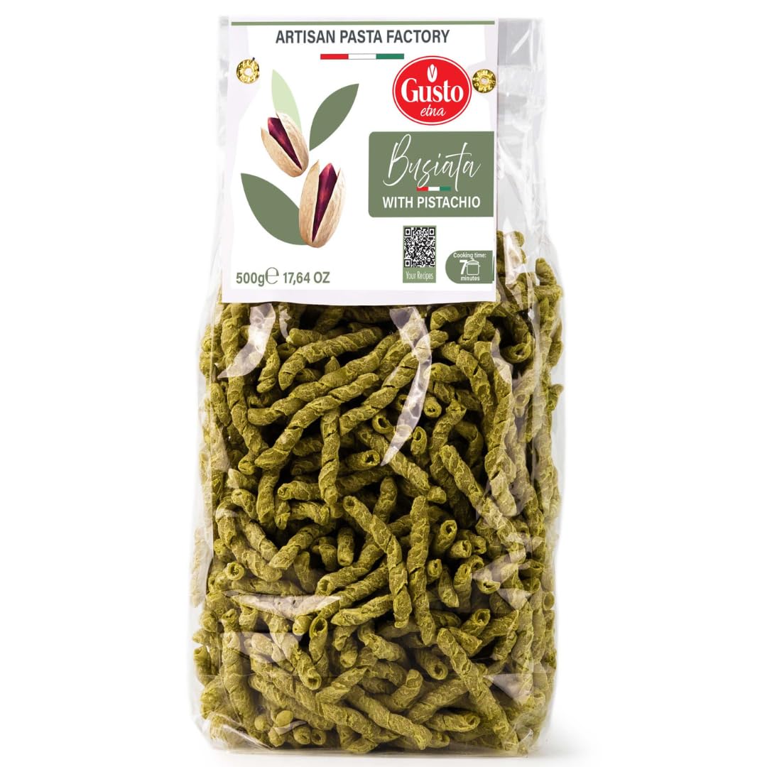 Bag of Gusto Etna artisan pasta, Busiata with Pistachio, 500g (17.64 oz), made from durum wheat and pistachio. The pasta has a twisted shape with a natural green color, visible through the transparent packaging, and is labeled with cooking time of 7 minutes