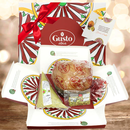 Gusto Etna Pistachio Panettone gift set, featuring a large artisanal panettone, piping bag filled with creamy pistachio butter, packet of chopped pistachios, and decorative gift box with a colorful Sicilian-inspired design