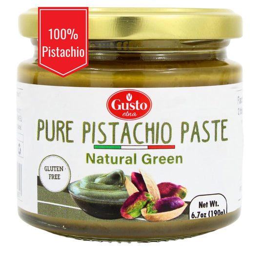 Glass jar of Gusto Etna Pure Pistachio Paste, labeled '100% Pistachio' and 'Natural Green,' with a gold lid. The label features a small bowl of green pistachio paste and whole pistachios, highlighting that the product is gluten-free, with a net weight of 6.7 oz (190g)