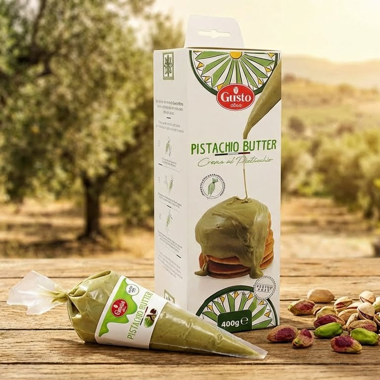 Gusto Pistachio Butter packaging with a natural background of trees and open space.