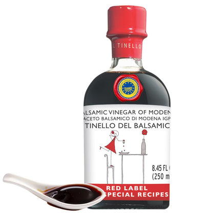 Bottle of balsamic vinegar with a Red Label on a white background