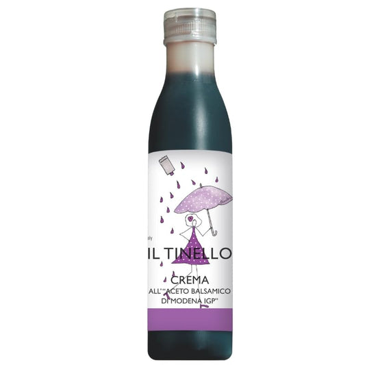 Bottle of Il Tinello Crema with a label featuring a cartoon character holding an umbrella on a white background.
