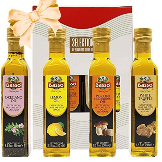 Four bottles of Basso olive oil with a gift box in the background