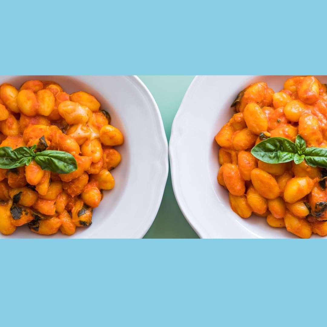 Two plates of Italian mini potato gnocchi served with rich tomato sauce, garnished with fresh basil leaves. Authentic L’Oro Del Sud gnocchi, perfect for traditional Italian meals
