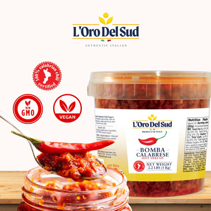 L'Oro Del SudBombá Calabrese jar with a spoonful of sauce on a white background