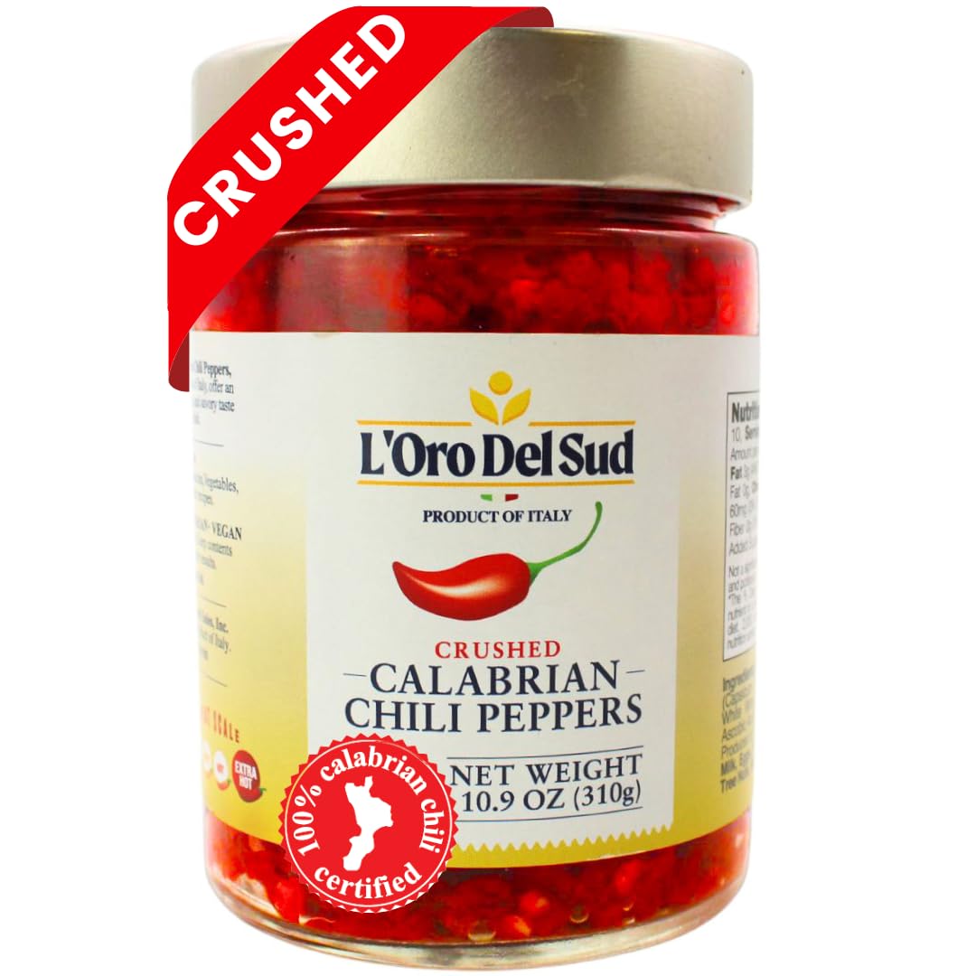 Jar of L'Oro Del Sud crushed Calabrian chili peppers with a red label.