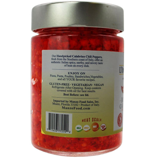 Jar of red Calabrian chili peppers with a label on a white background