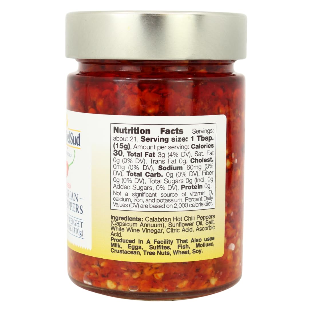 Jar of hot pepper spread with nutrition label on a white background