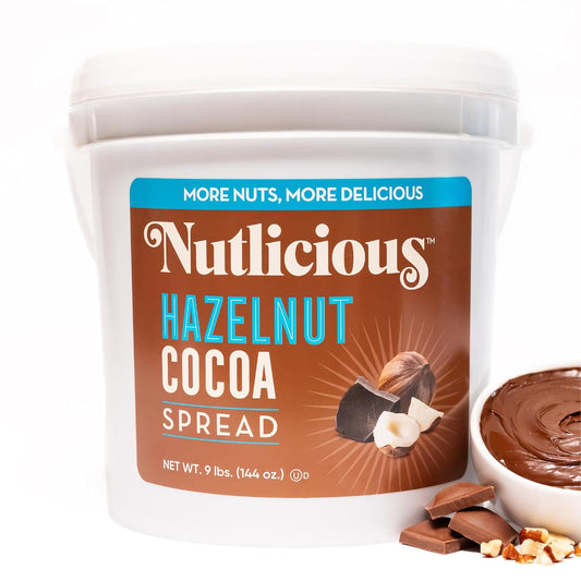 Container of Nutlicious Hazelnut Cocoa Spread with a bowl of spread and chocolate pieces on a white background